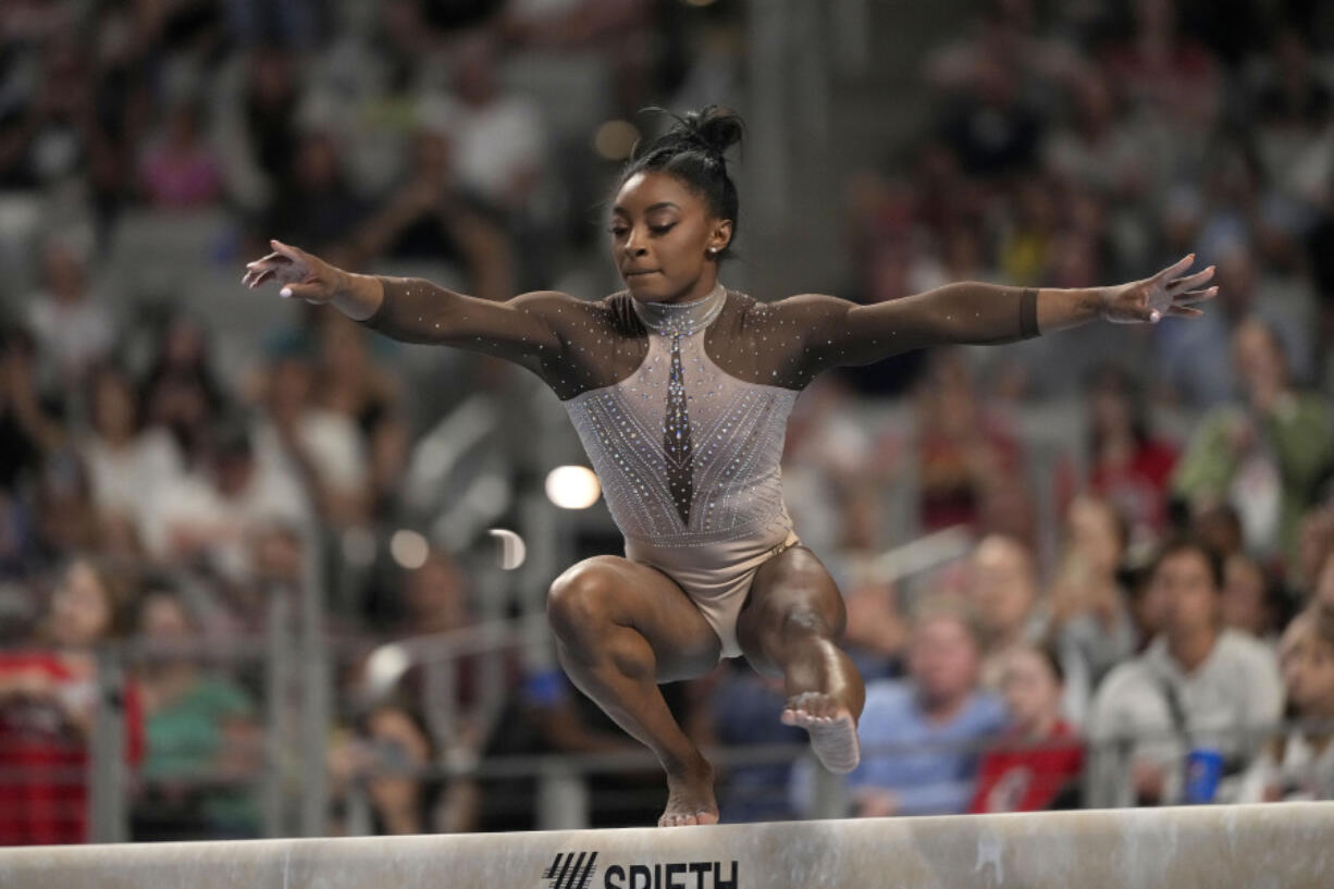 Simone Biles competes on the balance beam during the U.S. Gymnastics Championships, Sunday in Fort Worth, Texas.