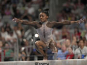 Simone Biles competes on the balance beam during the U.S. Gymnastics Championships, Sunday in Fort Worth, Texas.