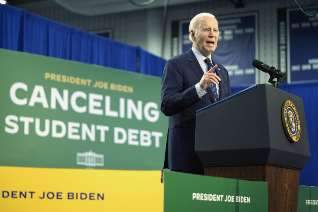 FILE - President Joe Biden speaks about student loan debt at Madison College, April 8, 2024, in Madison, Wis. Relatively few Americans say they&rsquo;re fans of Biden&rsquo;s work on the issue of student loans, according to a new poll from the University of Chicago Harris School of Public Policy and The Associated Press-NORC Center for Public Affairs Research conducted May 16-21. The survey found that three in 10 U.S. adults say they approve of how Biden has handled the issue of student loan debt, while 4 in 10 disapprove.