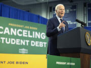 FILE - President Joe Biden speaks about student loan debt at Madison College, April 8, 2024, in Madison, Wis. Relatively few Americans say they&rsquo;re fans of Biden&rsquo;s work on the issue of student loans, according to a new poll from the University of Chicago Harris School of Public Policy and The Associated Press-NORC Center for Public Affairs Research conducted May 16-21. The survey found that three in 10 U.S. adults say they approve of how Biden has handled the issue of student loan debt, while 4 in 10 disapprove.