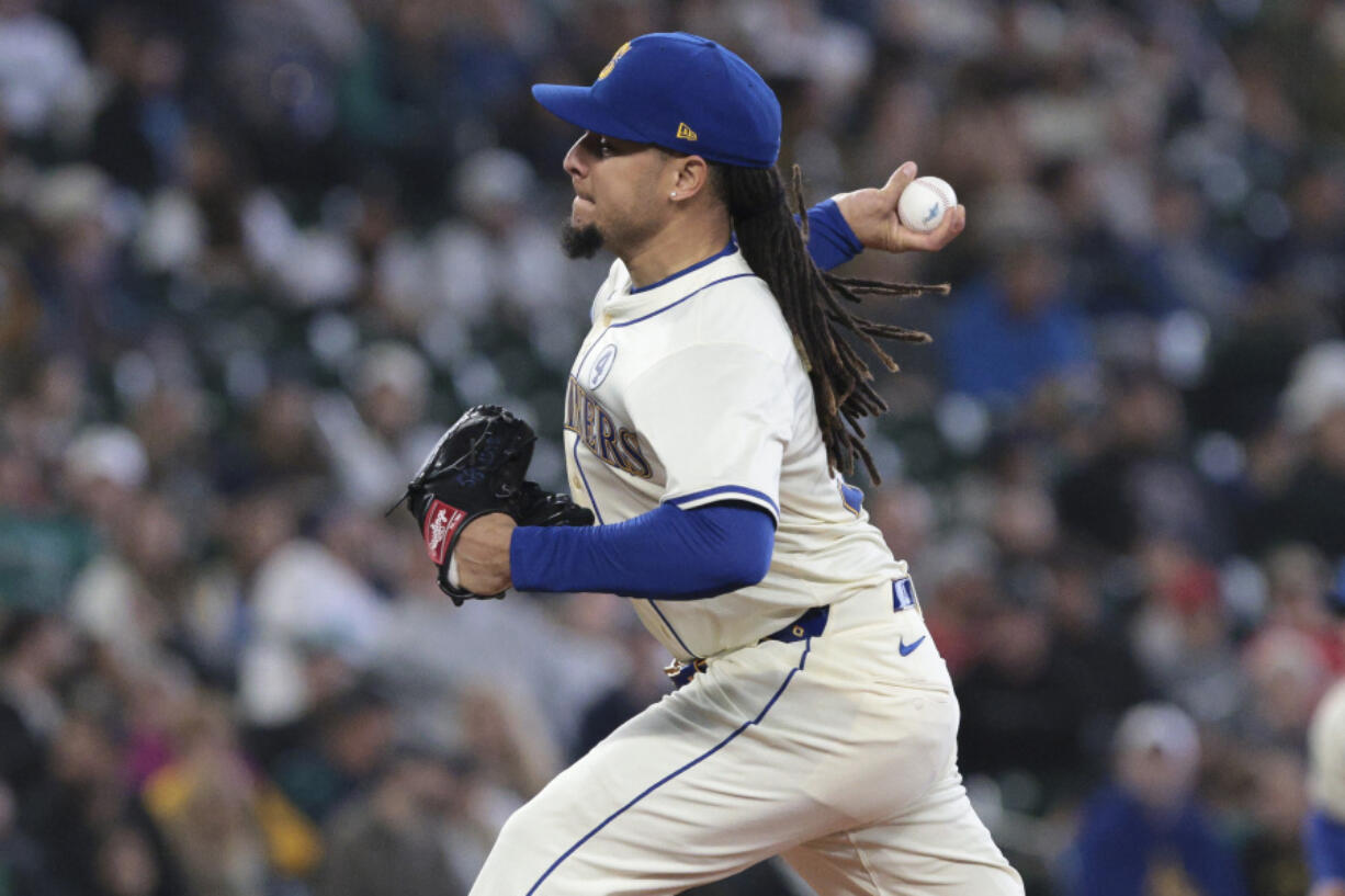 Seattle Mariners starting pitcher Luis Castillo throws during the seventh inning of a baseball game against the Los Angeles Angels, Sunday, June 2, 2024, in Seattle.