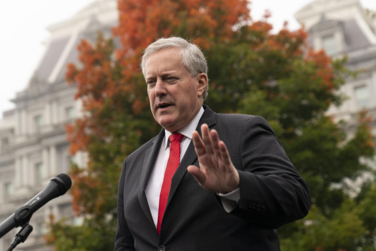 FILE - White House former chief of staff Mark Meadows speaks with reporters at the White House, Wednesday, Oct. 21, 2020, in Washington. Meadows appeared by videoconference, Friday, June 7, 2024, in Phoenix, pleading not guilty to nine felony charges stemming from their roles in an effort to overturn Trump&rsquo;s election loss in Arizona to Joe Biden.