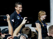 Jared Isaacman, left, and Hayley Arceneaux prepare to head to a launchpad Sept. 15, 2021, for a launch on a SpaceX Falcon 9 at the Kennedy Space Center in Cape Canaveral, Fla. New research presents the largest set of information yet regarding how the human body reacts to spaceflight.