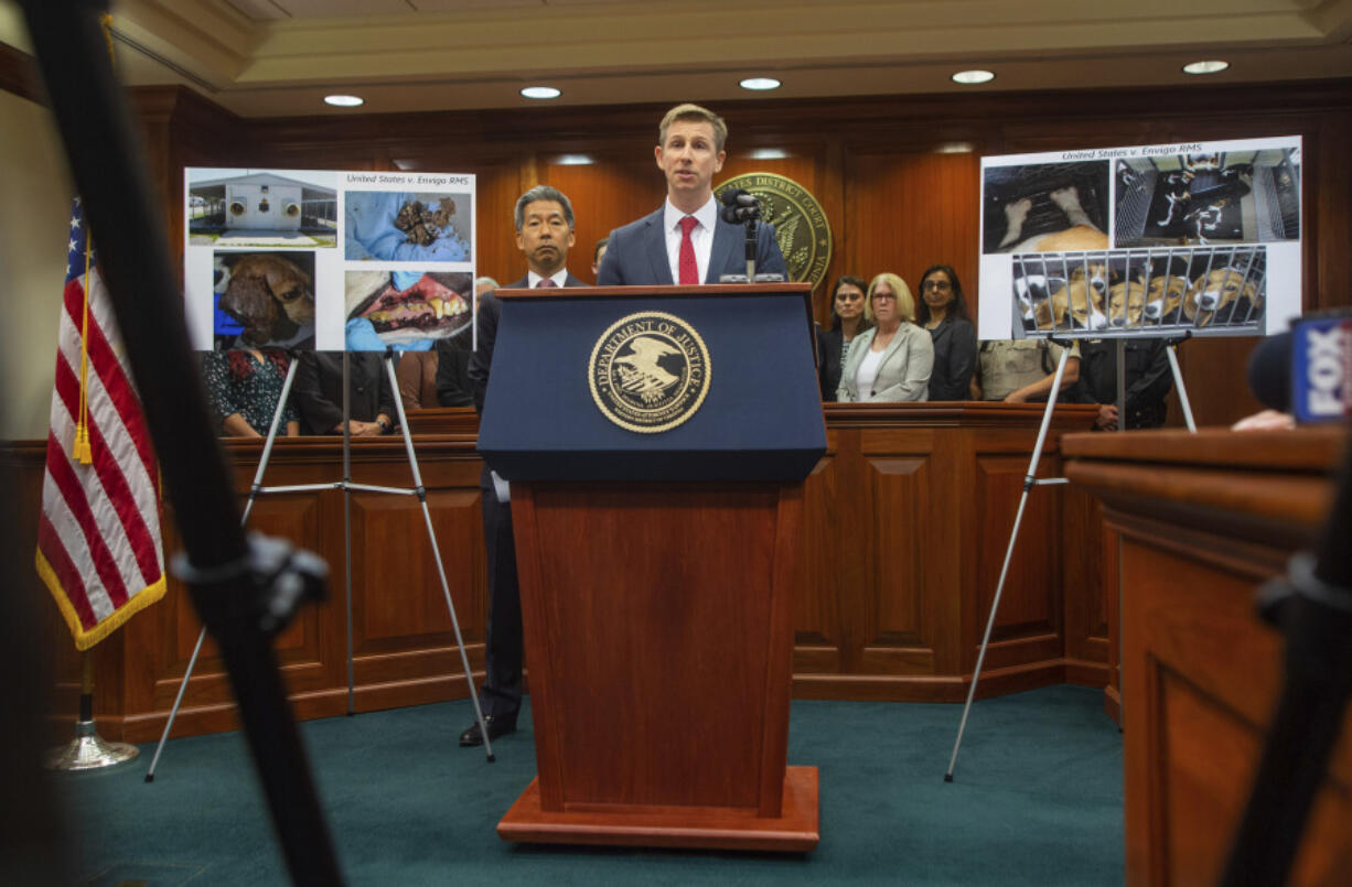 Christopher R. Kavanaugh, U.S. Attorney for the Western District of Virginia, speaks at the podium at the Federal Courthouse in Charlottesville during a press conference where the United States Justice Department discusses the plea agreement reached with Envigo RMS, an animal breeder in Cumberland Va., for $35 Million in an animal welfare case on June 3, 2024.