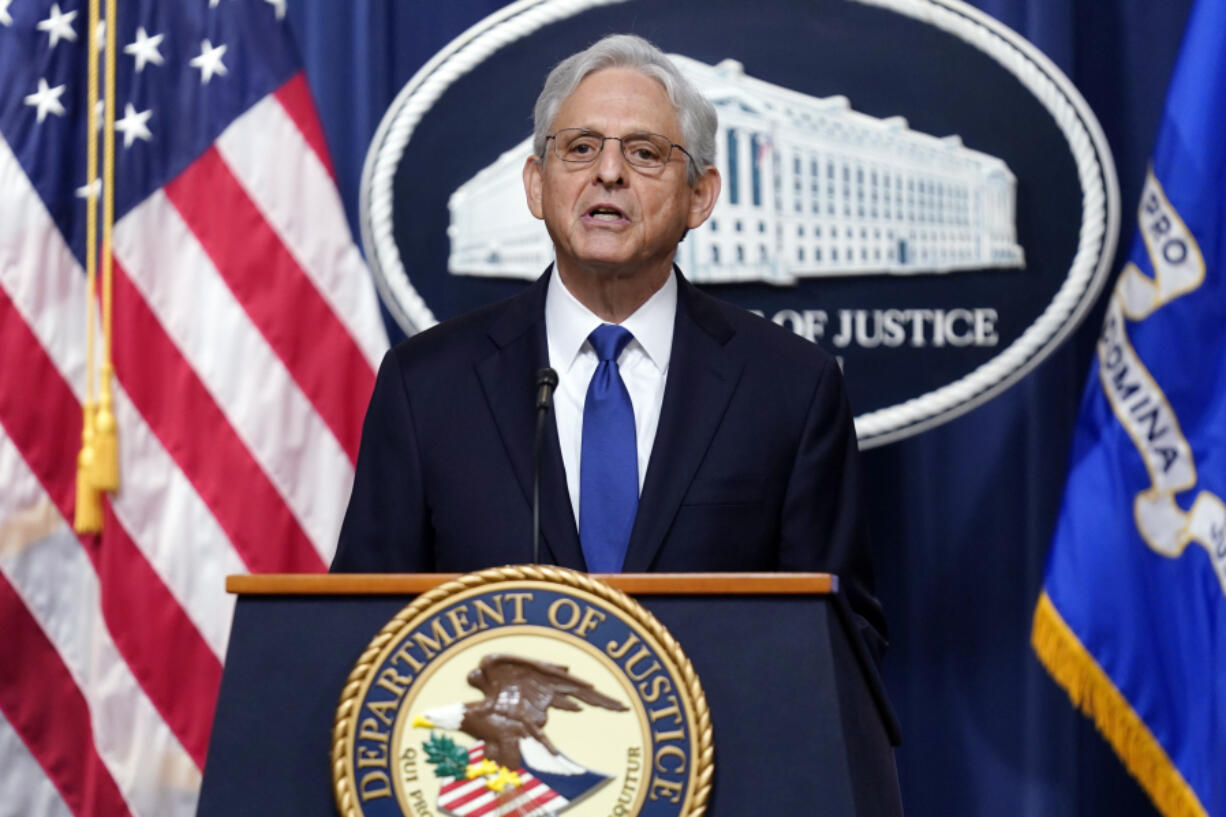 FILE - Attorney General Merrick Garland speaks at the Department of Justice, Aug. 11, 2023, in Washington.