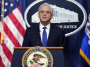 FILE - Attorney General Merrick Garland speaks at the Department of Justice, Aug. 11, 2023, in Washington.