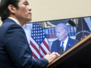 FILE - Special Counsel Robert Hur listens to recorded remarks of President Joe Biden during a hearing of the House Judiciary Committee in the Rayburn Office Building on Capitol Hill in Washington, March 12, 2024.