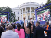 FILE - Guests respond as Broadway Inspirational Voices performs during a Juneteenth concert on the South Lawn of the White House in Washington, June 13, 2023. Biden will celebrate the Juneteenth holiday early with a concert on the White House South Lawn on Monday night. Singers Gladys Knight and Patti LaBelle will be among the performers. Biden signed a law in 2021 that made June 19, or Juneteenth, a federal holiday.