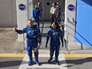 NASA astronauts Butch Wilmore, left, and Suni Williams leave the operations and checkout building for a trip to launch pad at Space Launch Complex 41 Saturday, June 1, 2024, in Cape Canaveral, Fla. The two astronauts are scheduled to liftoff later today on the Boeing Starliner capsule for a trip to the international space station. .