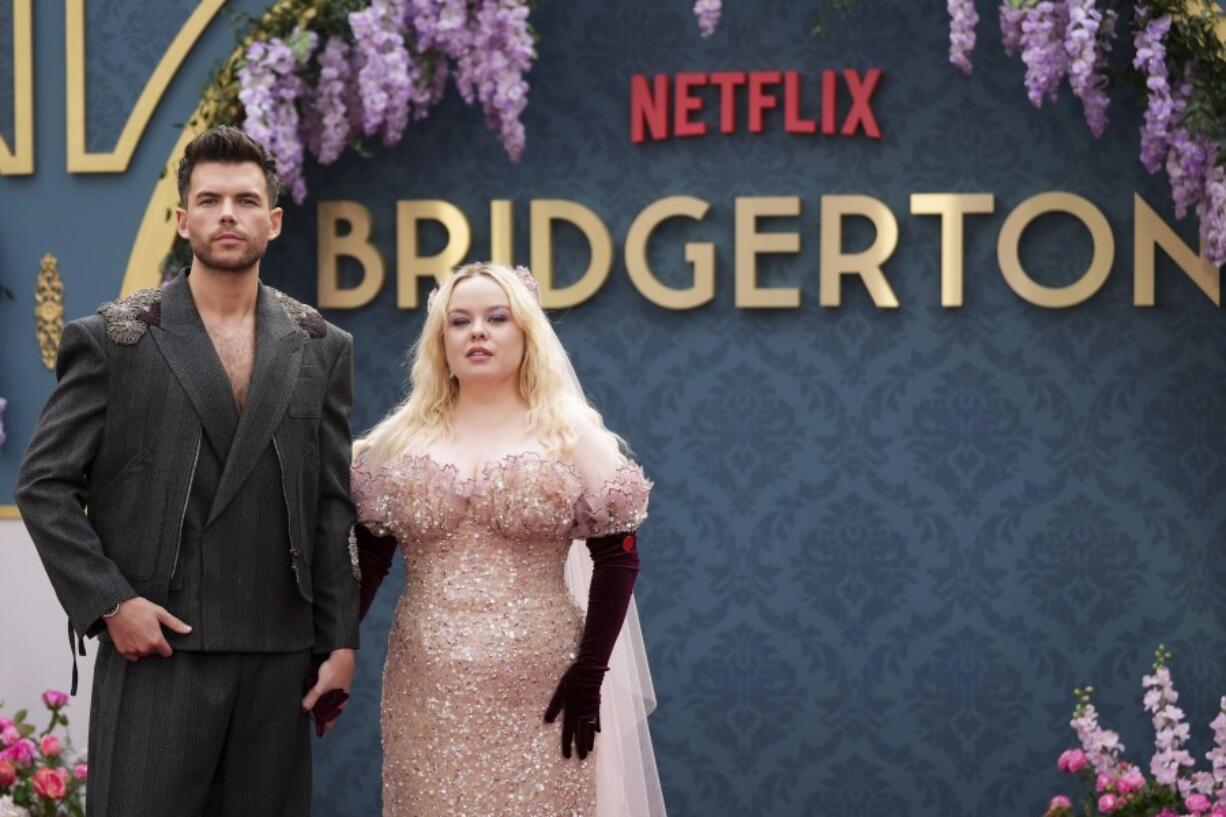 Luke Newton, left, and Nicola Coughlin arrive June 12 at the season three part two screening of the TV series &ldquo;Bridgerton&rdquo; in London.