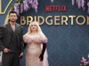 Luke Newton, left, and Nicola Coughlin arrive June 12 at the season three part two screening of the TV series &ldquo;Bridgerton&rdquo; in London.