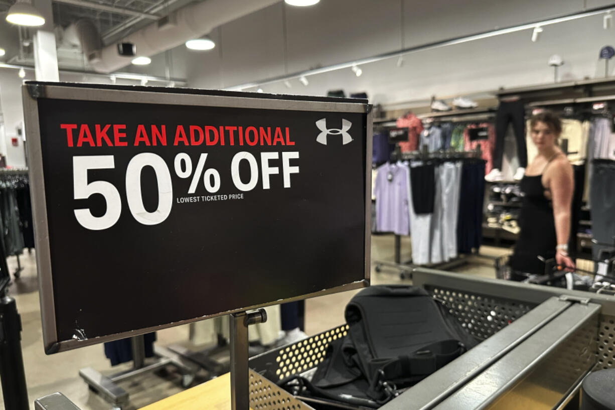 A sale sign is displayed at a retail store in Rosemont, Ill., Tuesday, June 25, 2024. On Friday, June 28, 2024, the government reports on the inflation gauge that the Federal Reserve follows most closely, a data set that will influence the Fed&rsquo;s decision on when to begin cutting interest rates in the coming months. (AP Photo/Nam Y.