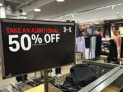 A sale sign is displayed at a retail store in Rosemont, Ill., Tuesday, June 25, 2024. On Friday, June 28, 2024, the government reports on the inflation gauge that the Federal Reserve follows most closely, a data set that will influence the Fed&rsquo;s decision on when to begin cutting interest rates in the coming months. (AP Photo/Nam Y.