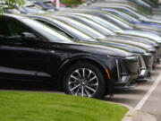 FILE - Vehicles sit in a row outside a dealership, June 2, 2024, in Lone Tree, Colo. Car dealerships across North America have faced a major disruption this week. CDK Global, a company that provides software for thousands of auto dealers in the U.S. and Canada, was hit by back-to-back cyberattacks on Wednesday, June 19, 2024.