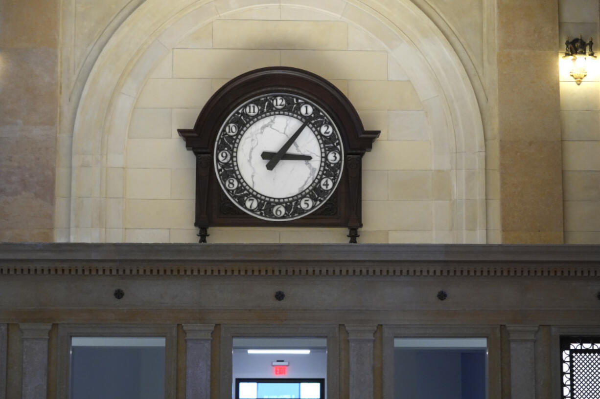 A newly crafted clock above the former ticket windows at the Michigan Central Station is seen, Monday, May 13, 2024 in Detroit. A once hulking scavenger-ravaged monolith that symbolized Detroit&rsquo;s decline reopens this week after a massive six-year multimillion dollar renovation by Ford Motor Co., which restored the Michigan Central Station to its past grandeur with a focus squarely on the future of mobility.