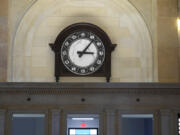 A newly crafted clock above the former ticket windows at the Michigan Central Station is seen, Monday, May 13, 2024 in Detroit. A once hulking scavenger-ravaged monolith that symbolized Detroit&rsquo;s decline reopens this week after a massive six-year multimillion dollar renovation by Ford Motor Co., which restored the Michigan Central Station to its past grandeur with a focus squarely on the future of mobility.