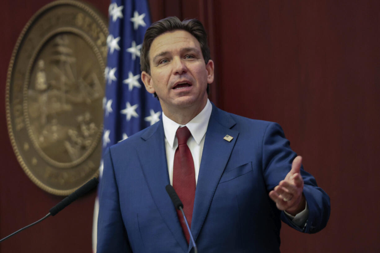 FILE - Florida Gov. Ron DeSantis gives his State of the State address during a joint session of the Senate and House of Representatives in Tallahassee, Fla., Jan. 9, 2024. Months after Disney DeSantis&rsquo; appointees agreed to end a protracted legal fight, the two sides are set to approve an agreement Wednesday, June 5, that could result in the company investing $17 billion into its Florida resort and opens the door to a fifth major theme park at Walt Disney World.