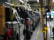 FILE - 2024 Ford F-150 trucks are assembled at Ford&rsquo;s Dearborn Truck Plant on April 11, 2024, in Dearborn, Mich. On Thursday, June 27, 2024, the government issues the third and final estimate of economic growth &ndash; the gross domestic product &ndash; in the January-March quarter.