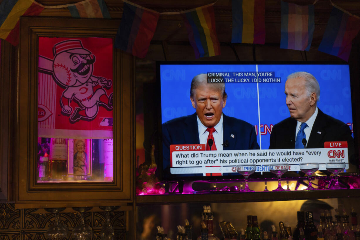 President Joe Biden, right, and Republican presidential candidate former President Donald Trump, left, are seen on a television at Tillie&#039;s Lounge during the presidential debate on Thursday, June 27, 2024, in Cincinnati. For many voters in the U.S., there&#039;s despair in the air after the presidential debate this past week.