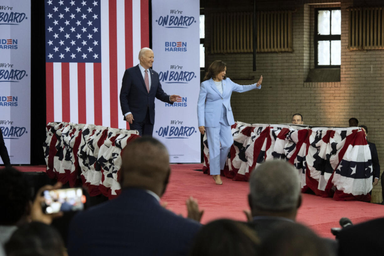 President Joe Biden and Vice President Kamala Harris wave at a campaign event at Girard College, Wednesday, May 29, 2024, in Philadelphia.