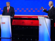 President Joe Biden, right, and Republican presidential candidate former President Donald Trump, left, participate in a presidential debate hosted by CNN, Thursday, June 27, 2024, in Atlanta.