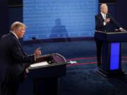 FILE - President Donald Trump and Democratic presidential candidate former Vice President Joe Biden debate during the first presidential debate Sept. 29, 2020, at Case Western University and Cleveland Clinic, in Cleveland.