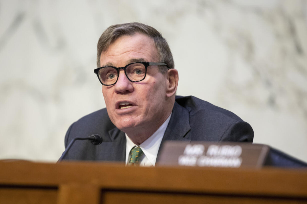 FILE - Mark Warner, D-Va., chairman of the Senate Intelligence Committee, speaks during a hearing at the Capitol in Washington, March 8, 2023. Warner said Monday, June 3, 2024, the U.S. may be less prepared for the threat of foreign election disinformation ahead of this year&rsquo;s election than it was four years ago. Warner based his assessment on the development of powerful new AI programs that make it easier than ever to generate deepfake audio and video that can fool voters.