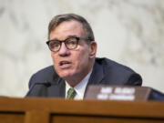 FILE - Mark Warner, D-Va., chairman of the Senate Intelligence Committee, speaks during a hearing at the Capitol in Washington, March 8, 2023. Warner said Monday, June 3, 2024, the U.S. may be less prepared for the threat of foreign election disinformation ahead of this year&rsquo;s election than it was four years ago. Warner based his assessment on the development of powerful new AI programs that make it easier than ever to generate deepfake audio and video that can fool voters.