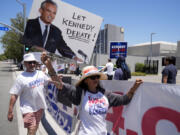 Supporters of Presidential candidate Robert F. Kennedy Jr. protest outside the Warner Bros. Studios in Burbank, Calif., Friday, June 21, 2024. Warner Bros. Discovery, CNN&rsquo;s parent company, plans to relocate to its Burbank studios.  Host network CNN said Thursday the independent presidential candidate fell short of benchmarks both for state ballot qualification and polling. The missed markers mean the June 27 showdown will be solely between President Joe Biden and Donald Trump.