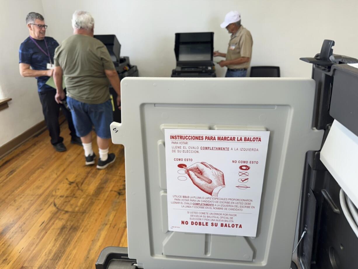 A voter submits his ballot in Bernalillo, N.M., on Tuesday, June 4, 2024. New Mexico voters are picking their partisan favorites in Tuesday&rsquo;s primary to reshape a Democratic-led Legislature, with all 112 seats up for election in November.