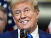 Republican presidential candidate former President Donald Trump speaks with reporters at the National Republican Senatorial Committee, Thursday, June 13, 2024, in Washington.