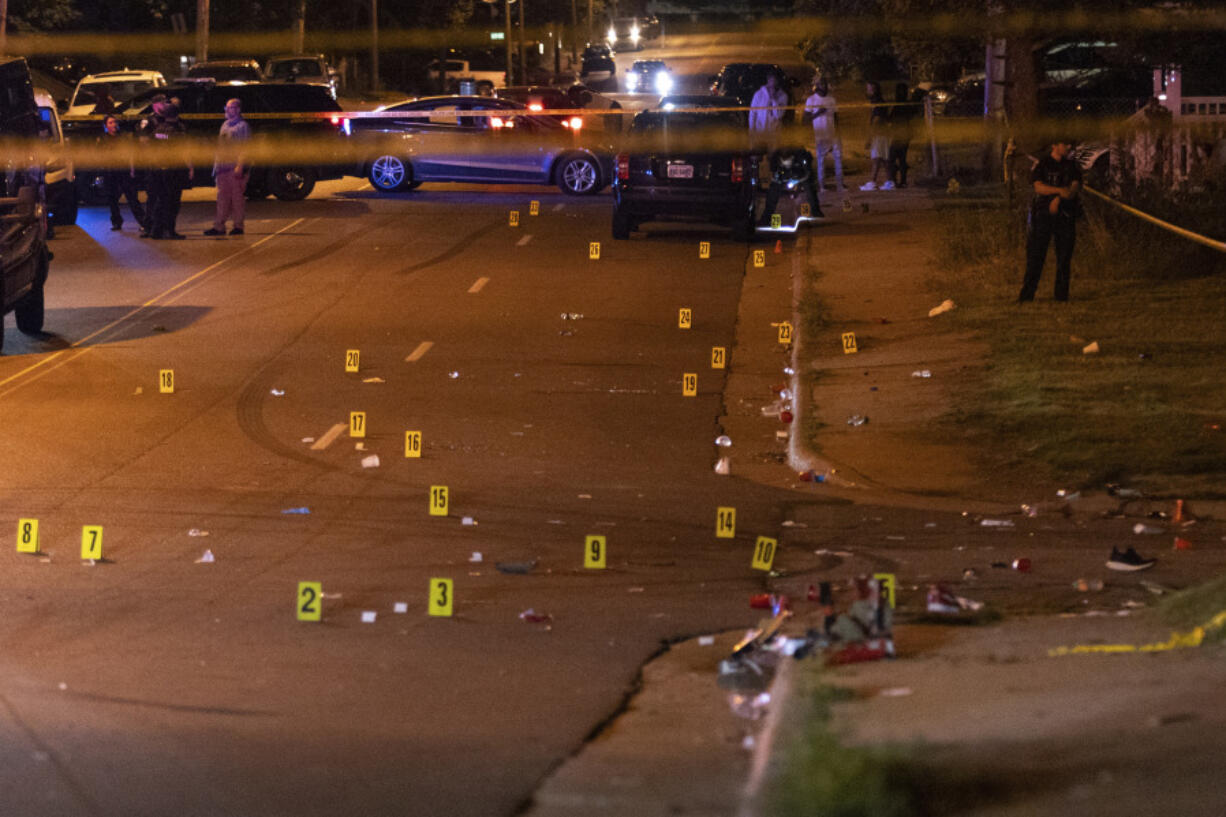 This image, courtesy of News 5 Cleveland, shows officers of the Akron Police Department working on the scene of a shooting that happened overnight in Akron, Ohio, Sunday, June 2, 2024.