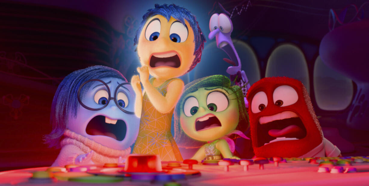 This image released by Disney/Pixar shows, from left, Sadness, voiced by Phyllis Smith, Joy, voiced by Amy Poehler, Disgust, voiced by Liza Lapira, Fear, voiced by Tony Hale and Anger, voiced by Lewis Black, in a scene from &ldquo;Inside Out 2.&rdquo; (Disney/Pixar via AP)