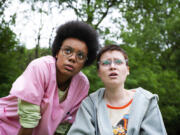 This image released by A24 shows Leah Harvey, left, and Lola Petticrew in a scene from &ldquo;Tuesday.&rdquo; (Kevin Baker/A24 via AP)