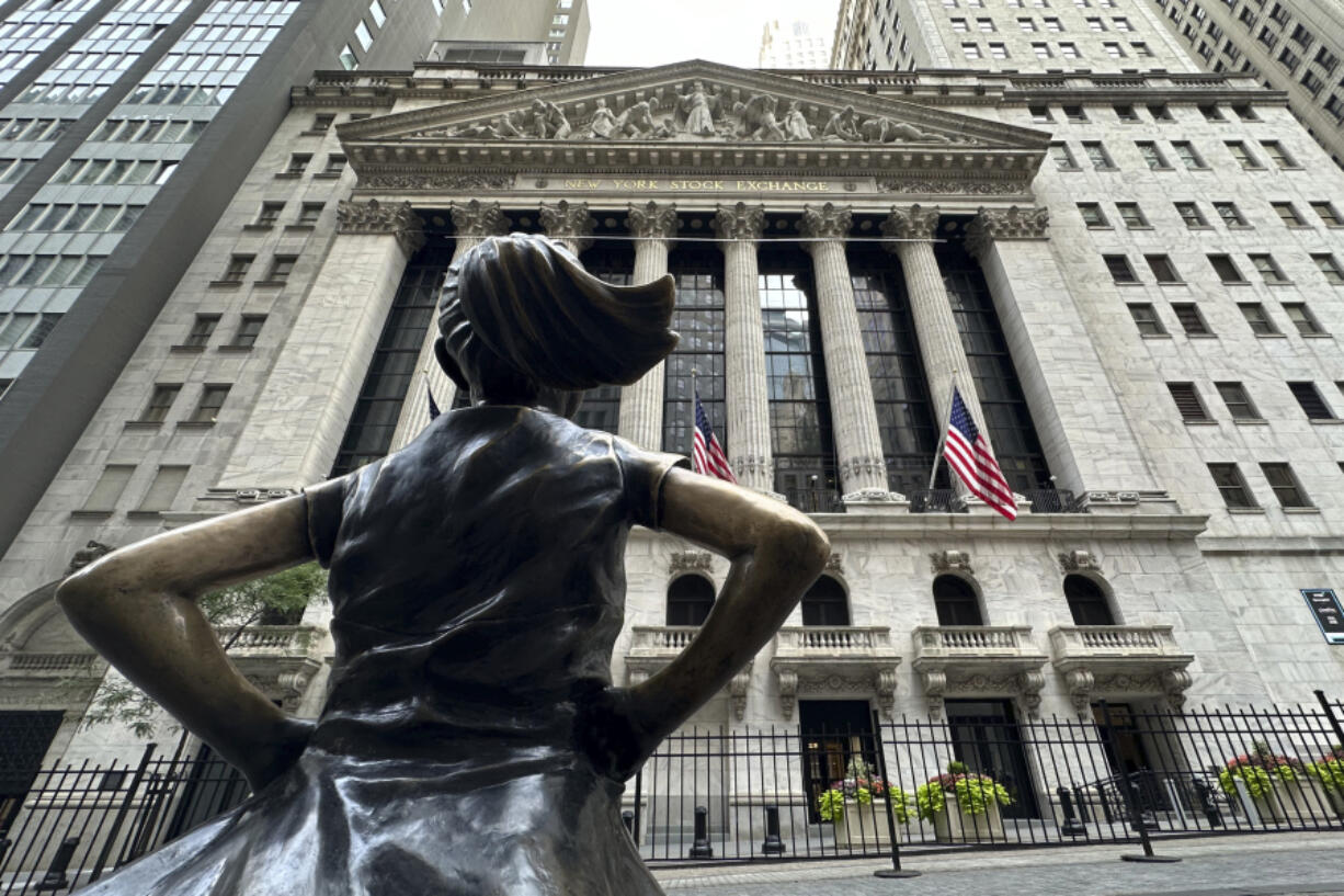 The Fearless Girl statue stands in front of the New York Stock Exchange on Wednesday, June 26, 2024 in New York. Shares have advanced in Europe and Asia after a rebound for Nvidia offset weakness on Wall Street.