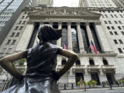 The Fearless Girl statue stands in front of the New York Stock Exchange on Wednesday, June 26, 2024 in New York. Shares have advanced in Europe and Asia after a rebound for Nvidia offset weakness on Wall Street.