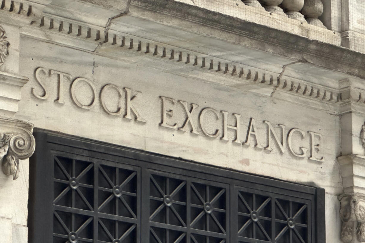 FILE - A sign at the New York Stock Exchange is shown on June 18, 2024 in New York. Global shares are mostly lower on Friday, June 21, 2024, after a retreat on Wall Street, where a drop in Nvidia stock pulled stocks lower.