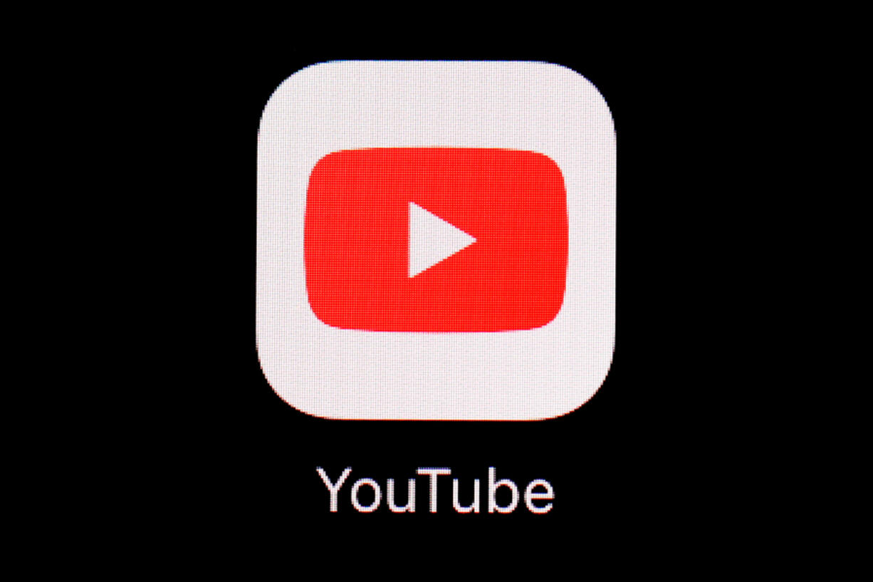 FILE - The YouTube app is seen on an iPad, March 20, 2018, in Baltimore. YouTube announced Wednesday, June 5, 2024, that it is changing its policies about firearm videos in an effort to keep potentially dangerous content from reaching underage users.