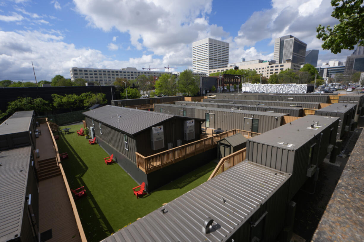 The gated micro community known as &ldquo;The Melody&rdquo; is shown Friday, April 12, 2024, in Atlanta. The Melody is a housing complex made from shipping containers and is intended to help house people from Atlanta&rsquo;s homeless population.