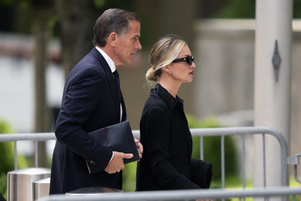 Hunter Biden, accompanied by his wife, Melissa Cohen Biden, arrive at federal court, Wednesday, June 5, 2024, in Wilmington, Del.