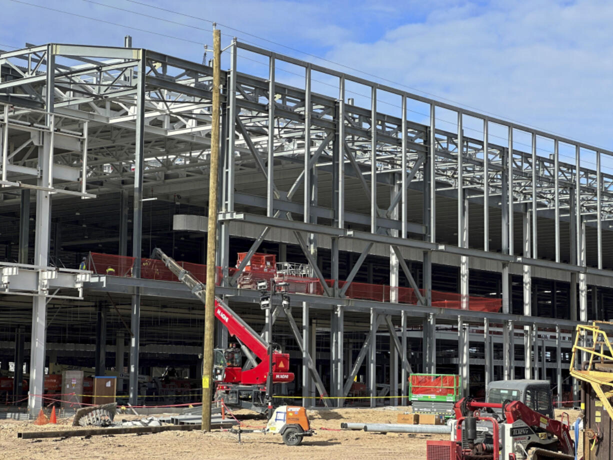 FILE - A factory building is under construction at Hyundai&rsquo;s first U.S. plant for manufacturing electric vehicles, Oct. 25, 2023, in Ellabell, Ga. On Monday, June 3, 2024, a Georgia conservation group filed notice of its intent to sue two U.S. government agencies, saying they failed to properly assess the environmental impacts of the $7.6 billion electric vehicle and battery plant Hyundai is building outside Savannah, Ga.