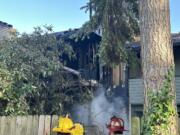 Firefighters respond to a Tuesday blaze at Erica Village in Hazel Dell.