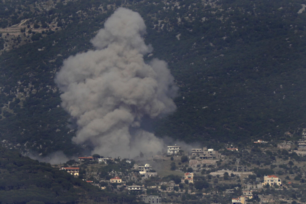 FILE - Black smoke rises from an Israeli airstrike on Kafar Hamam, a Lebanese border village with Israel in south Lebanon, on May 17, 2024. President Joe Biden has called for a quick ceasefire and end to the fighting between Israel and Hamas in the Gaza Strip, saying the militant group is no longer capable of launching an attack on Israel like the one on Oct. 7. Israel&#039;s Prime Minister Benjamin Netanyahu and far-right ministers disagree, saying that destroying Hamas will require continued Israeli military operations in the strip.