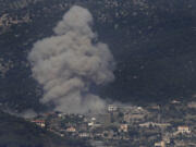 FILE - Black smoke rises from an Israeli airstrike on Kafar Hamam, a Lebanese border village with Israel in south Lebanon, on May 17, 2024. President Joe Biden has called for a quick ceasefire and end to the fighting between Israel and Hamas in the Gaza Strip, saying the militant group is no longer capable of launching an attack on Israel like the one on Oct. 7. Israel&#039;s Prime Minister Benjamin Netanyahu and far-right ministers disagree, saying that destroying Hamas will require continued Israeli military operations in the strip.