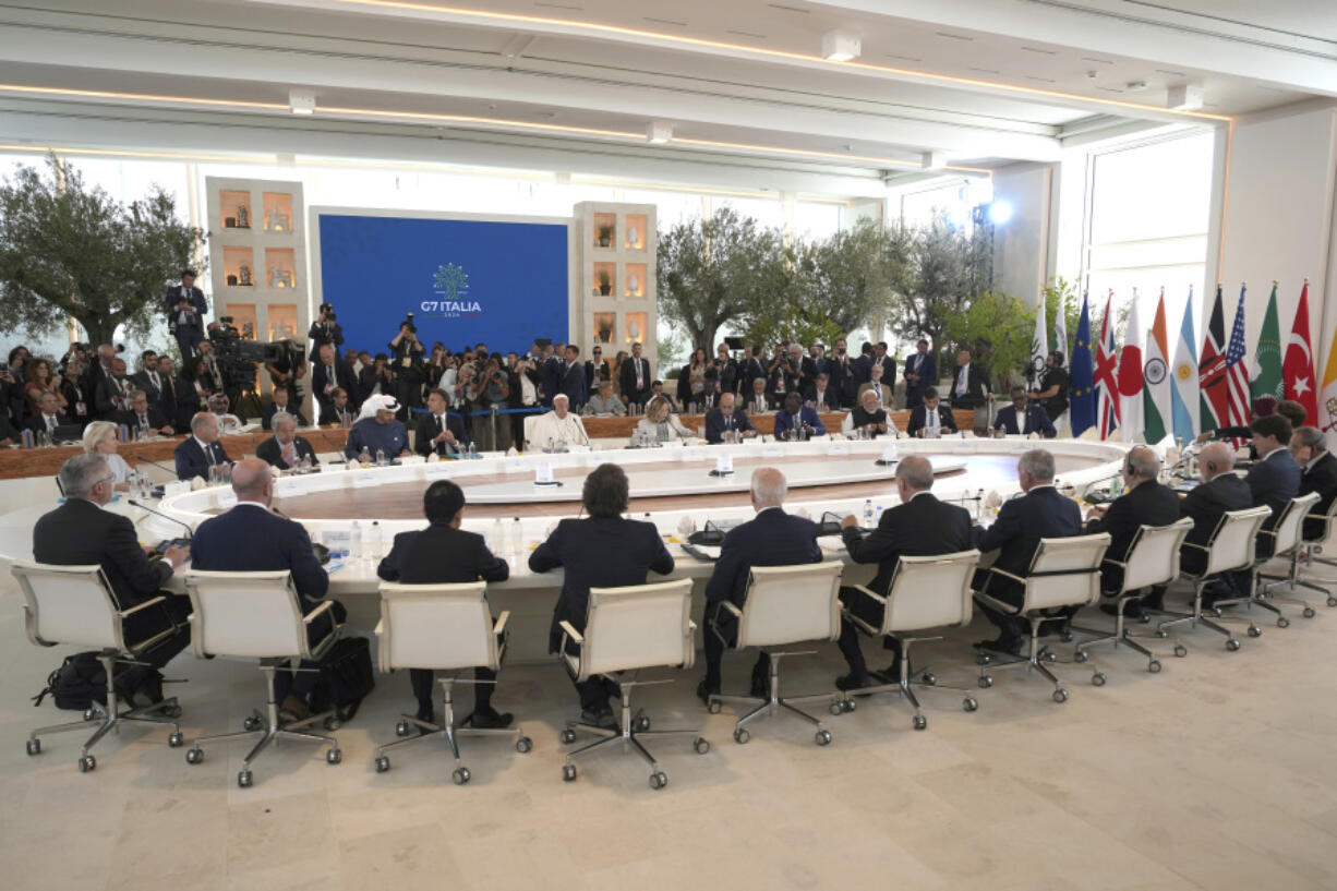 G7 world leaders and other leaders from guest nations attend a working session on Artificial Intelligence (AI), Energy, Africa-Mediterranean, on day two of the 50th G7 summit at Borgo Egnazia, southern Italy, on Friday, June 14, 2024.