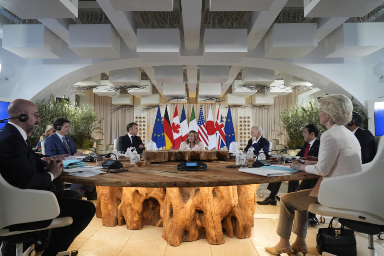 From left, European Council President Charles Michel, German Chancellor Olaf Scholz, Canada&rsquo;s Prime Minister Justin Trudeau, French President Emmanuel Macron, Italian Prime Minister Giorgia Meloni, U.S. President Joe Biden, Japan&rsquo;s Prime Minister Fumio Kishida, Britain&rsquo;s Prime Minister Rishi Sunak and European Commission President Ursula von der Leyen participate in a working session at the G7, Thursday, June 13, 2024, in Borgo Egnazia, Italy.