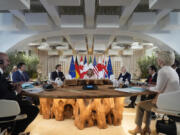 From left, European Council President Charles Michel, German Chancellor Olaf Scholz, Canada&rsquo;s Prime Minister Justin Trudeau, French President Emmanuel Macron, Italian Prime Minister Giorgia Meloni, U.S. President Joe Biden, Japan&rsquo;s Prime Minister Fumio Kishida, Britain&rsquo;s Prime Minister Rishi Sunak and European Commission President Ursula von der Leyen participate in a working session at the G7, Thursday, June 13, 2024, in Borgo Egnazia, Italy.