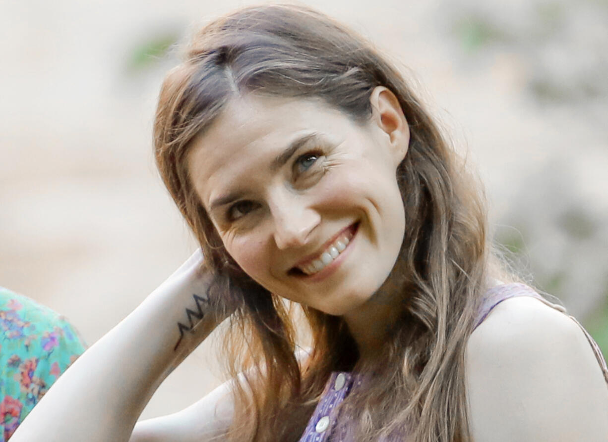 FILE - Amanda Knox attends a cocktail for the opening of the Innocence Project conference, in Modena, Italy, Thursday, June 13, 2019. Amanda Knox will be back in an Italian courtroom on Wednesday, June 5, 2024, to defend herself against a 16-year-old slander conviction that is the only charge against her that withstood five court rulings that ultimately cleared her in the brutal murder of her roommate, 21-year-old Meredith Kercher, in the apartment they shared in the idyllic central Italian university town of Perugia.