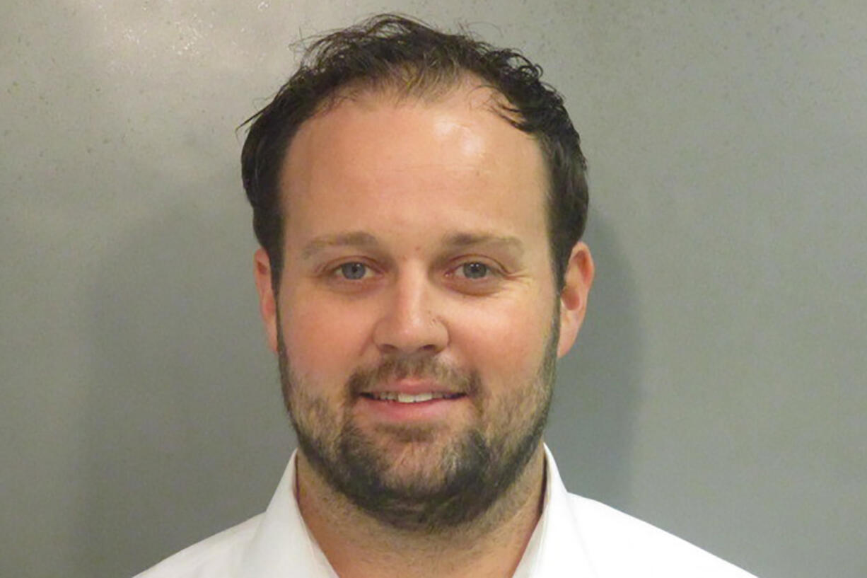 FILE - This undated photo provided by Washington County, Ark., Detention Center shows Josh Duggar. The Supreme Court has rejected an appeal from Josh Duggar, a former reality television star convicted of downloading child sexual abuse images. Duggar was on the TLC show &ldquo;19 Kids and Counting&rdquo; with his large family before his 2021 conviction.