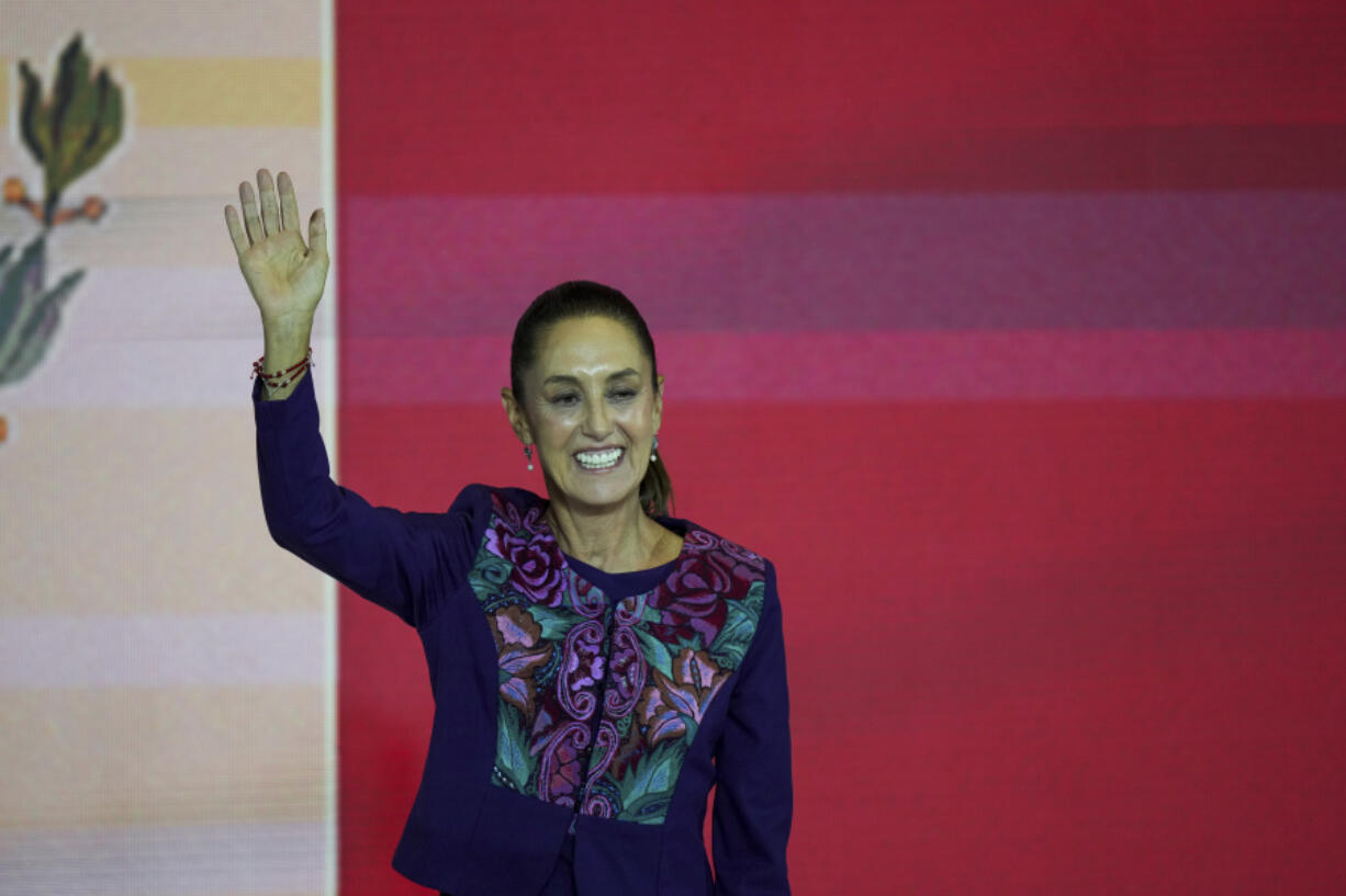 Ruling party presidential candidate Claudia Sheinbaum addresses supporters after the National Electoral Institute announced she held an irreversible lead in the race in Mexico City, early Monday, June 3, 2024.